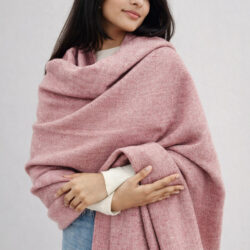 handwoven soft pink coloured himalayan wool shawl styled for winter wear