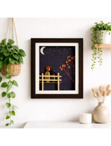 Handmade stone art of a couple on a bench under a crescent moon and starry sky with dried flowers.